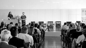 At the symposium at the University of Basel.