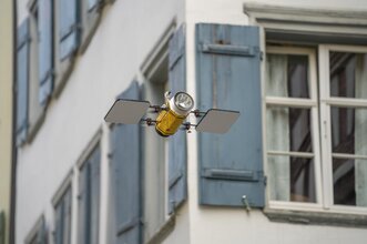 A satellite on its way through Switzerland: the DigitalLabor mascot